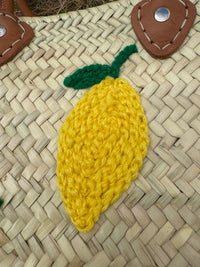 Panier rectangulaire tressé à la main à Marrakech, décor de citrons, anses courtes en cuir