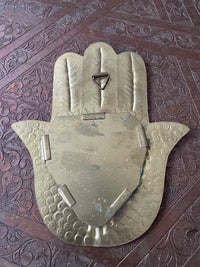 Joli miroir main de Fatma en laiton, fabrication artisanale à Marrakech